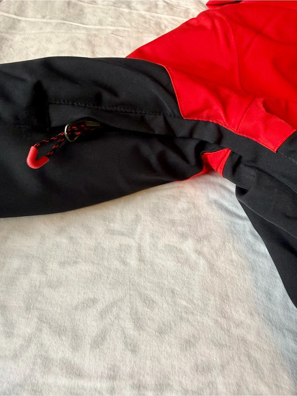 Obermeyer Boys' Axel Insulated Jacket in the colorway Brakelight (Red/Black)
